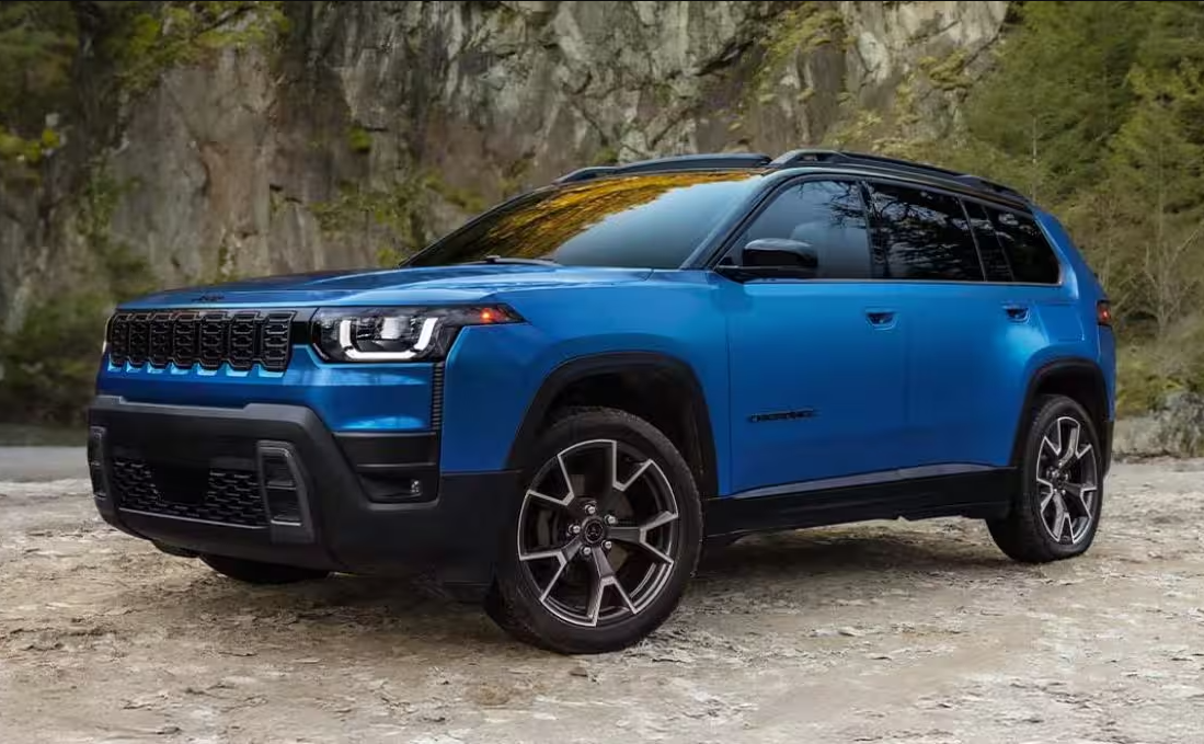 Blue 2026 Jeep Cherokee parked off-road